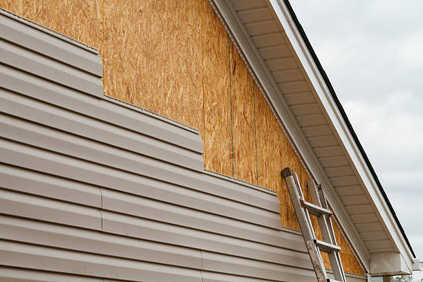 Professional Storm Damage Siding Repair technician working in Independence, OH